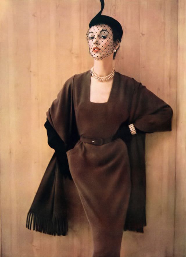 #14 June Duncan in Dorville wool dress and Otto Lucas hat, Harper’s Bazaar UK, November 1951.
