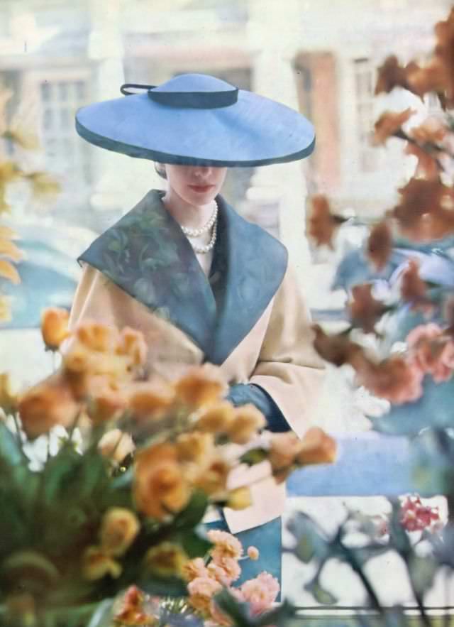 #18 Model in R.M.Hats’ blue shantung cartwheel hat, Harper’s Bazaar UK, July 1951.