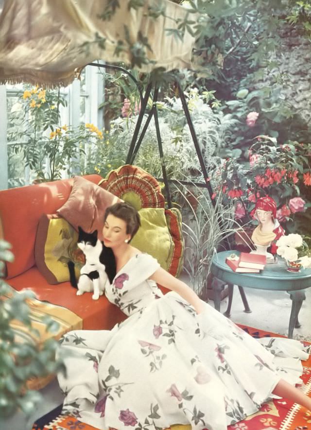 #1 Barbara Goalen in Neil Roger’s white organdie rose dress, Harper’s Bazaar UK, September 1950.