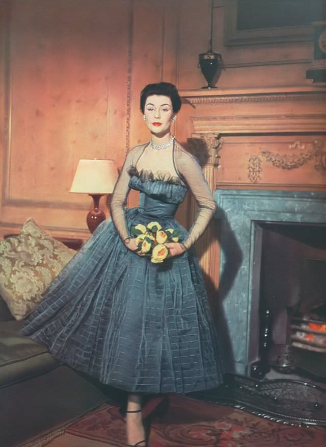 #23 Anne Gunning in Hardy Amies’ silk organza dress, Harper’s Bazaar UK, April 1952.