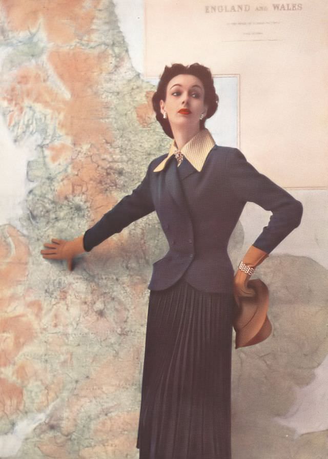 #29 June Duncan in Marcus Spring suit and Leathercraft accessories, Harper’s Bazaar UK, February 1952.