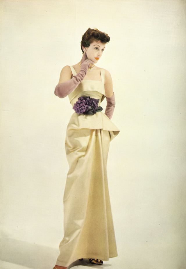 #3 Model in Frederick Starke’s gold satin evening dress and Cartier jewelry, Harper’s Bazaar UK, October 1950.
