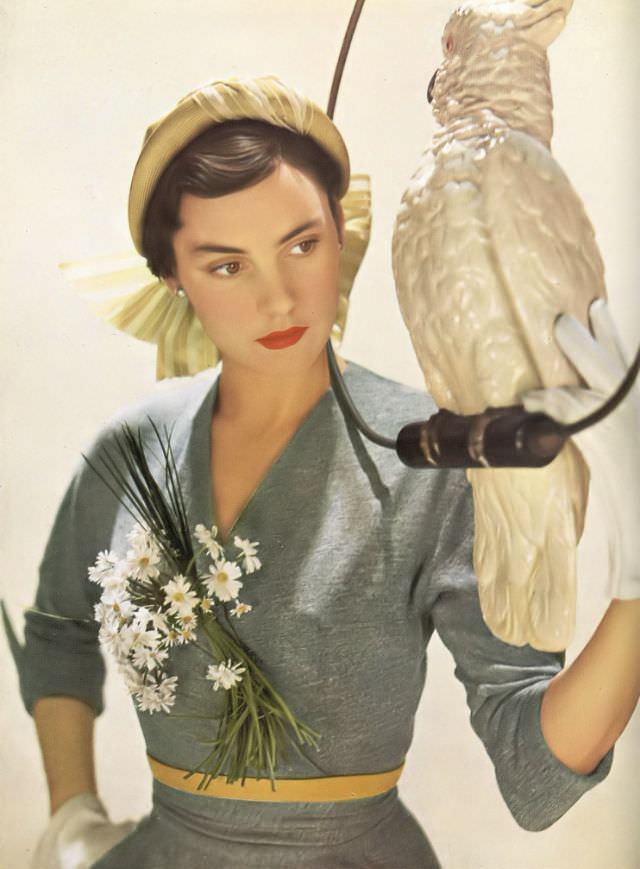 #5 Model in R.M.Hats’ lime straw hat and Matita’s gray wool dress, Harper’s Bazaar UK, February 1950.