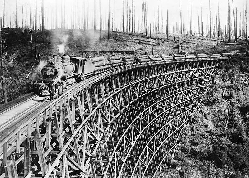 #1 Steam train carrying lumber on a trestle bridge, Northern Pacific Railroad tributary.