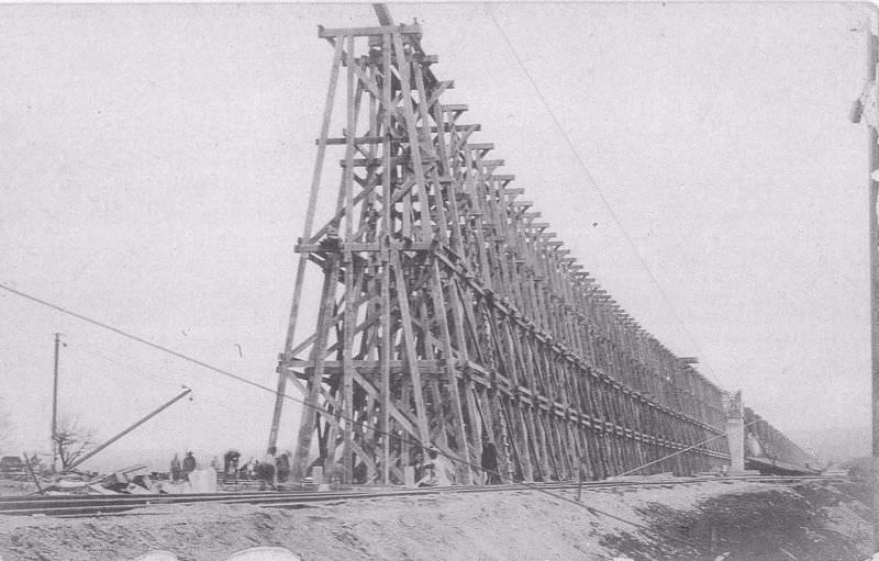 #19 Erie Railroad constructing trestle over B&S Railroad.