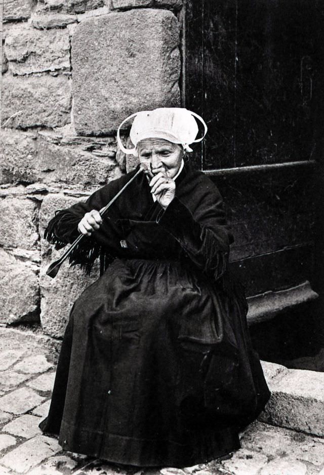 #33 Breton woman smoking a pipe in The Martyrdom.