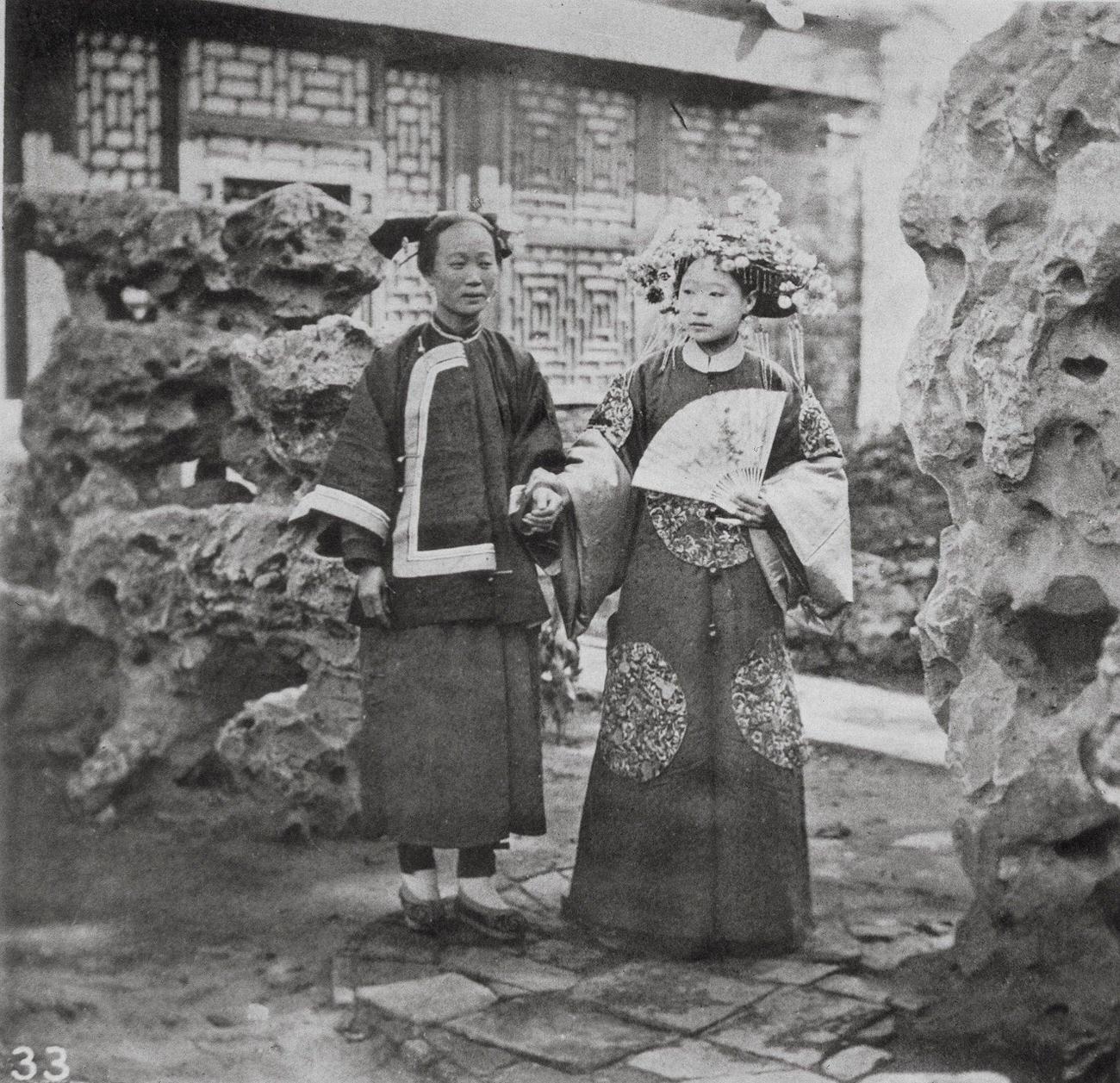 #40 Two Manchu Ladies in a Rock Garden, China, 1870s