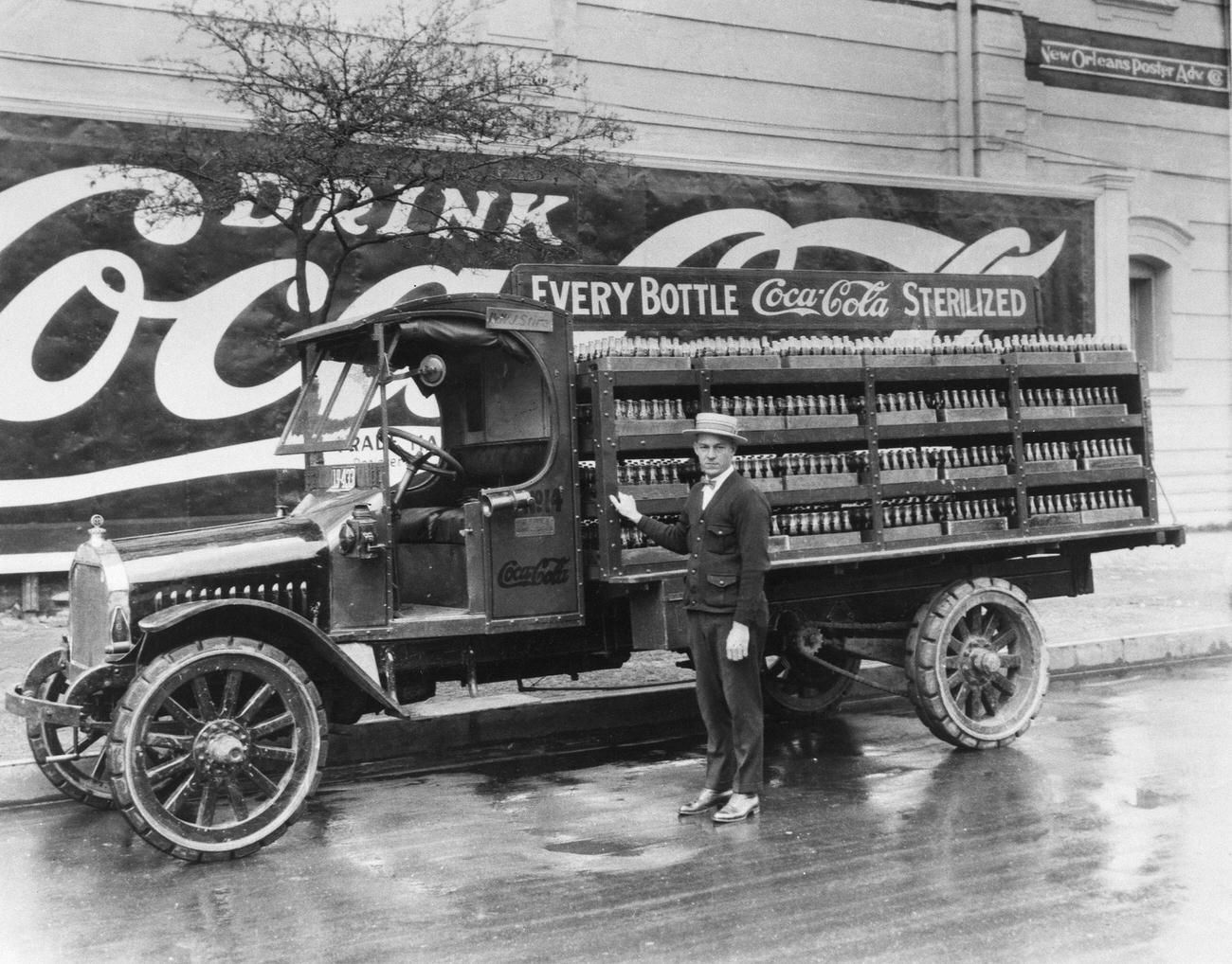 #12 A driver in New Orleans with his Coca-Cola delivery truck full of bottled soft drinks, 1929.