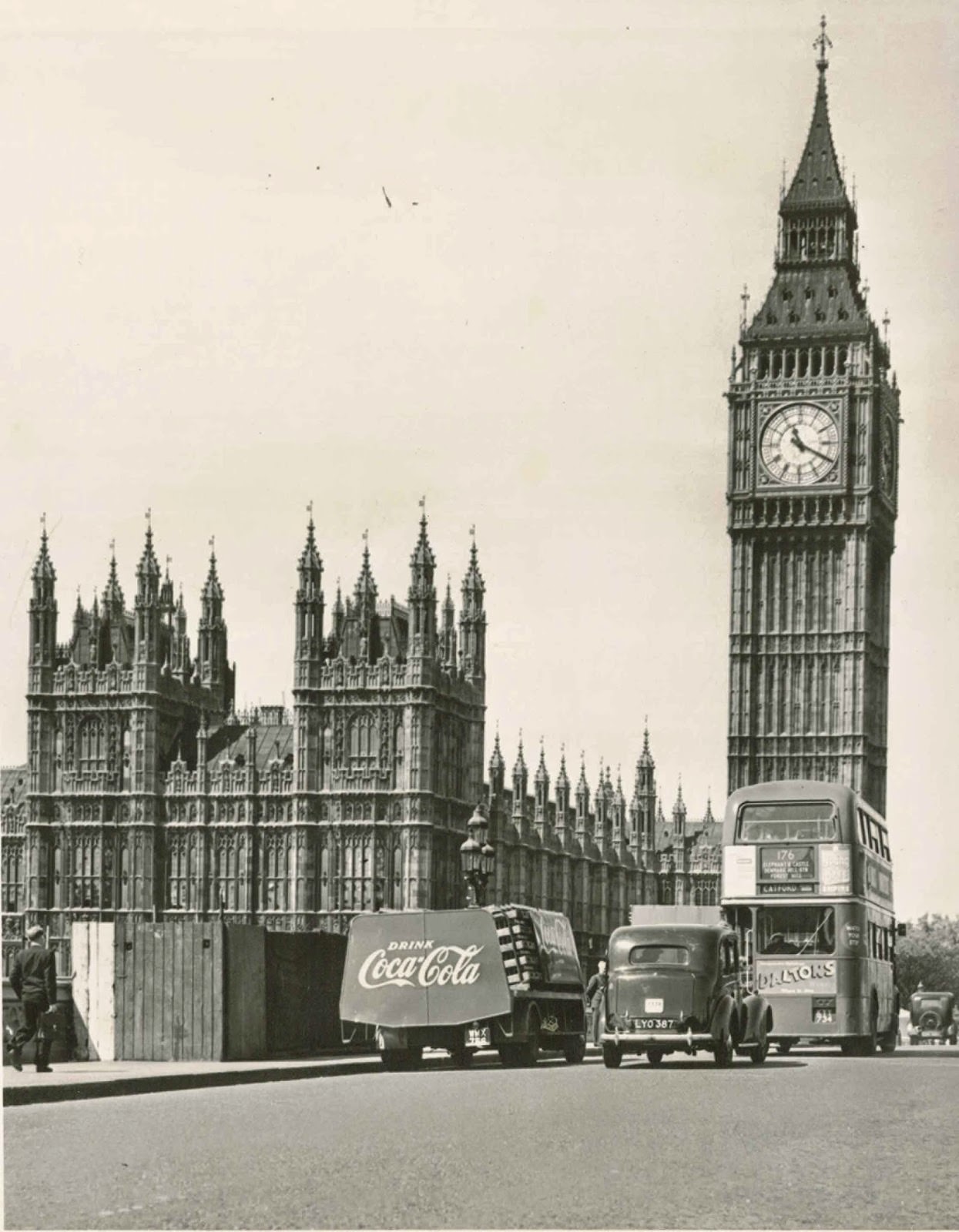 #23 A Coca-Cola delivery truck on Westminster Bridge with Big Ben and the Parliament buildings, 1953.