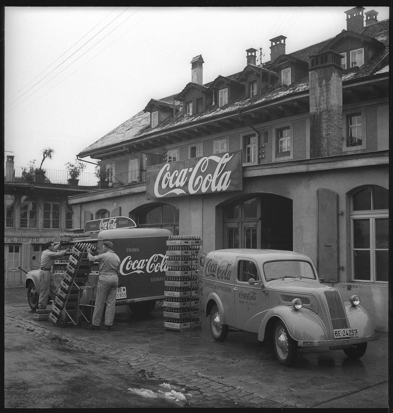 #3 Coca-Cola delivery vans being loaded in Bern, 1949.
