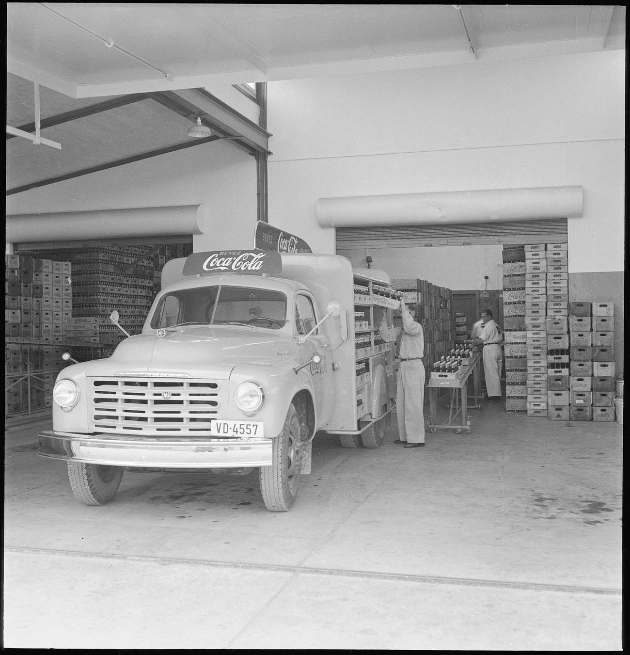 #5 Loading a Coca-Cola delivery van in Lausanne, 1949.