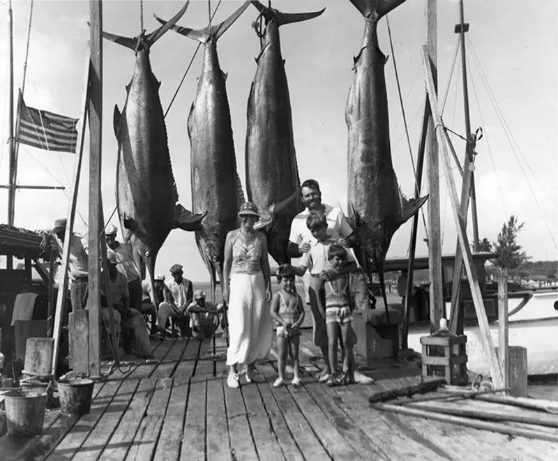 #9 Ernest Hemingway and family with marlins, Bimini, 1935.