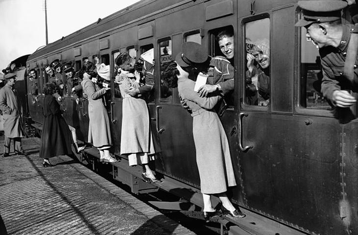 #11 Soldiers kissing loved ones before Egypt deployment, 1935.