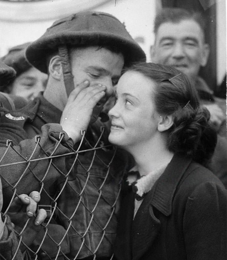#17 British soldier whispering to loved one, 1939.
