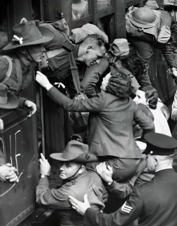 #23 Girl saying goodbye to WWII soldier, 1940.