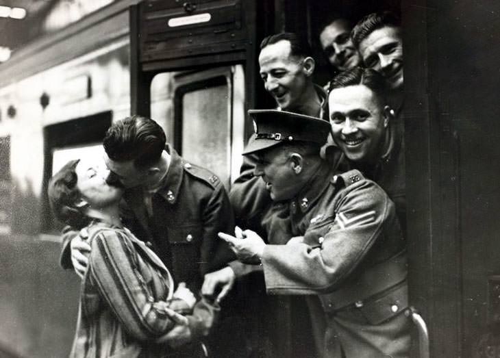#42 Soldier kissing girlfriend, Waterloo Station, London, 1939.