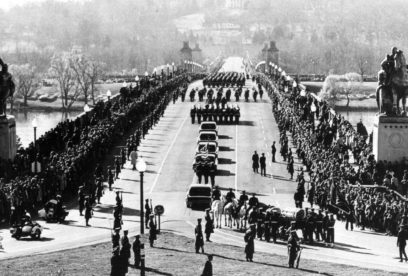 #18 John F. Kennedy’s funeral procession in Arlington Cemetery, Washington, after his assassination in Dallas, Texas, 1963.