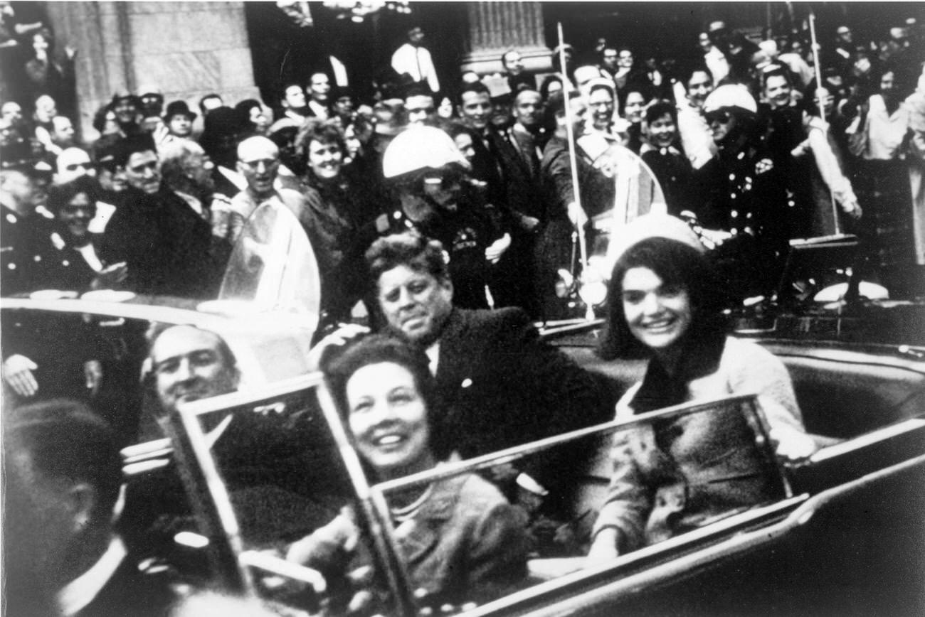 #3 John F. Kennedy, First Lady Jacqueline Kennedy, and Texas Governor John Connally with his wife in a Dallas motorcade, 1963.