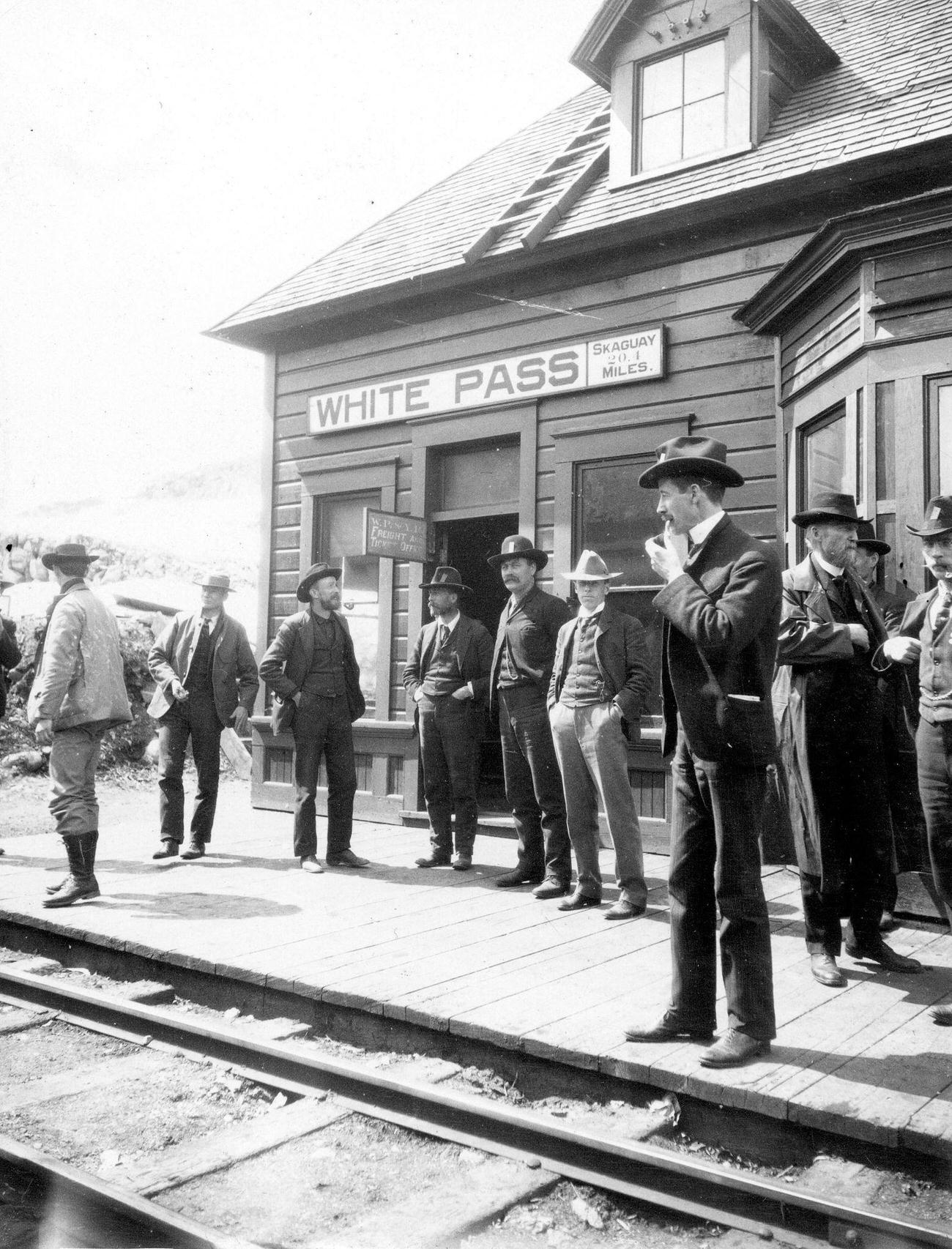 #46 Prospectors at the White Pass and Yukon Railroad Station in Alaska during the Klondike Gold Rush, 1900.