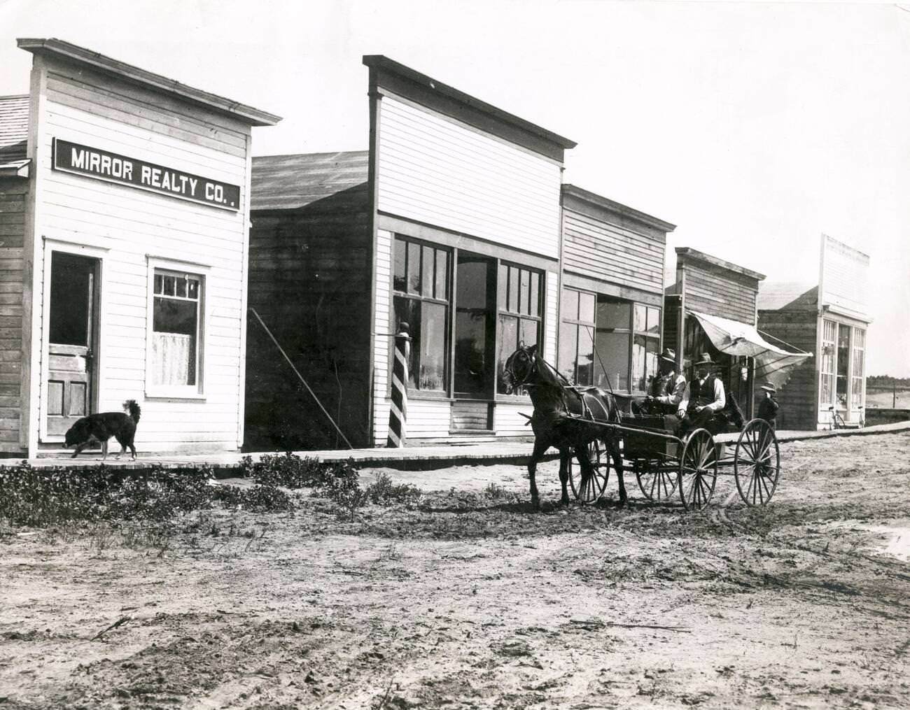 #72 Horse and buggy on a street in Dawson City, Canada, circa 1920, a base during the Klondike Gold Rush.