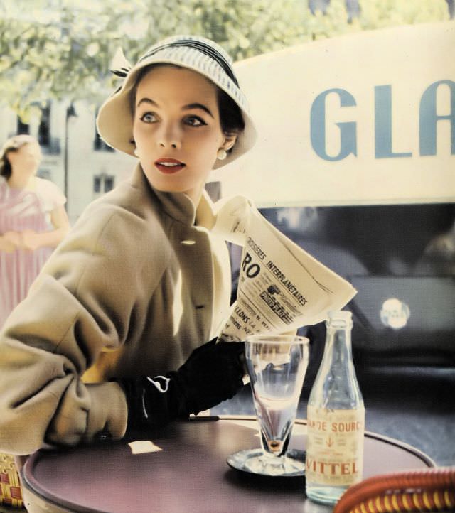 #22 Linda Harper wearing a zebra-striped felt cloche by Svend, 1953.