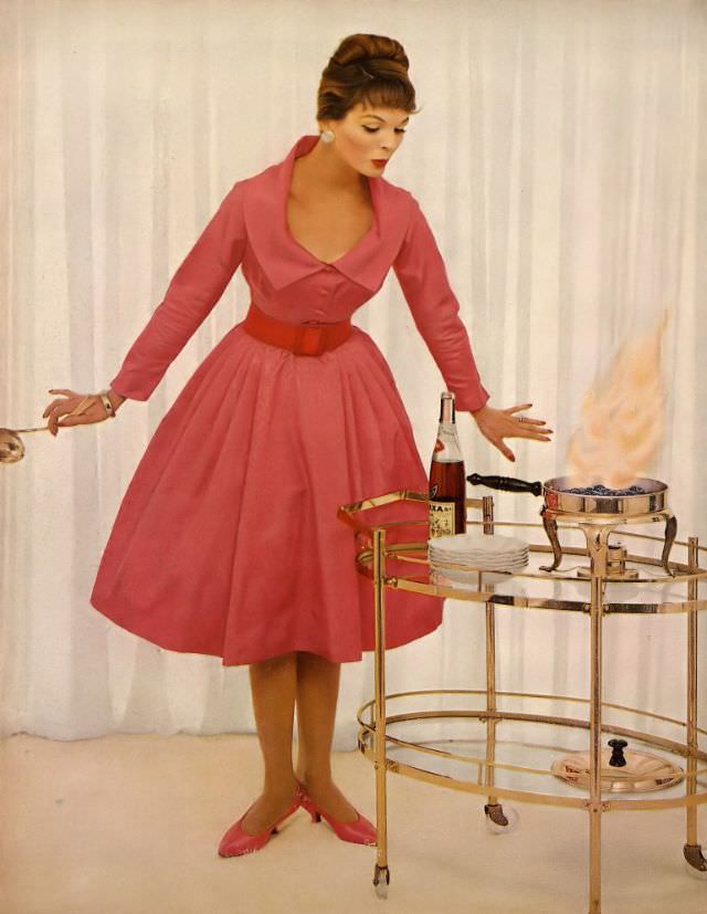 #18 Linda Harper in a pink moiré bodice and orange velveteen belt by Toni Owen, 1958.