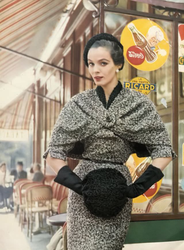 #6 Linda Harper in a nubby black-and-white tweed dress and Persian lamb accessories by Jacques Fath, Paris, 1953.