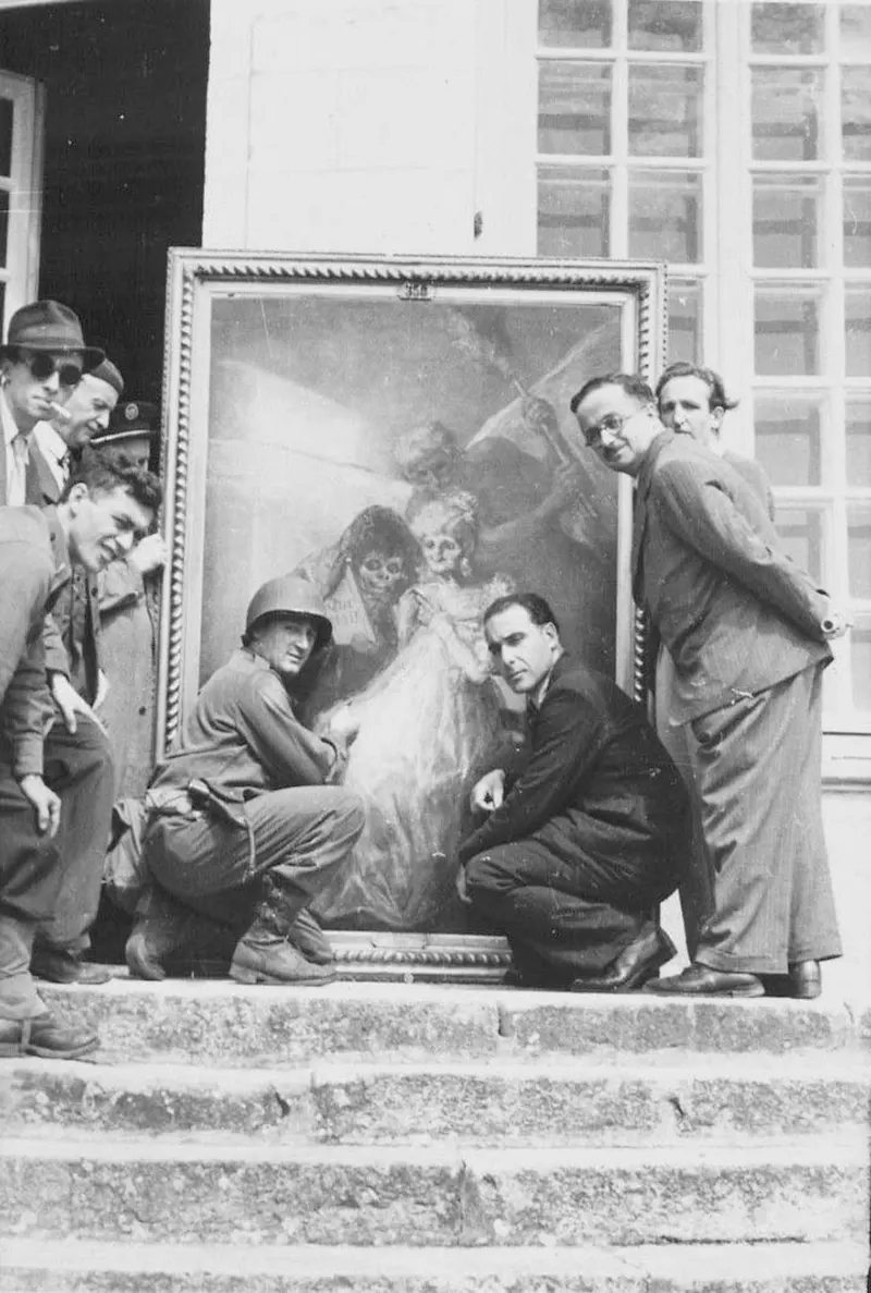#14 Monuments Man Daniel J. Kern, Karl Sieber with Jan van Eyck’s Adoration of the Mystic Lamb panels, Altaussee mine, 1945.