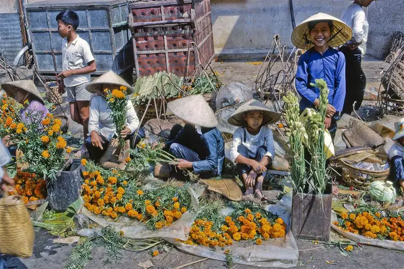 #8 Marigold vendors for TET celebration, My Tho market, 1969.
