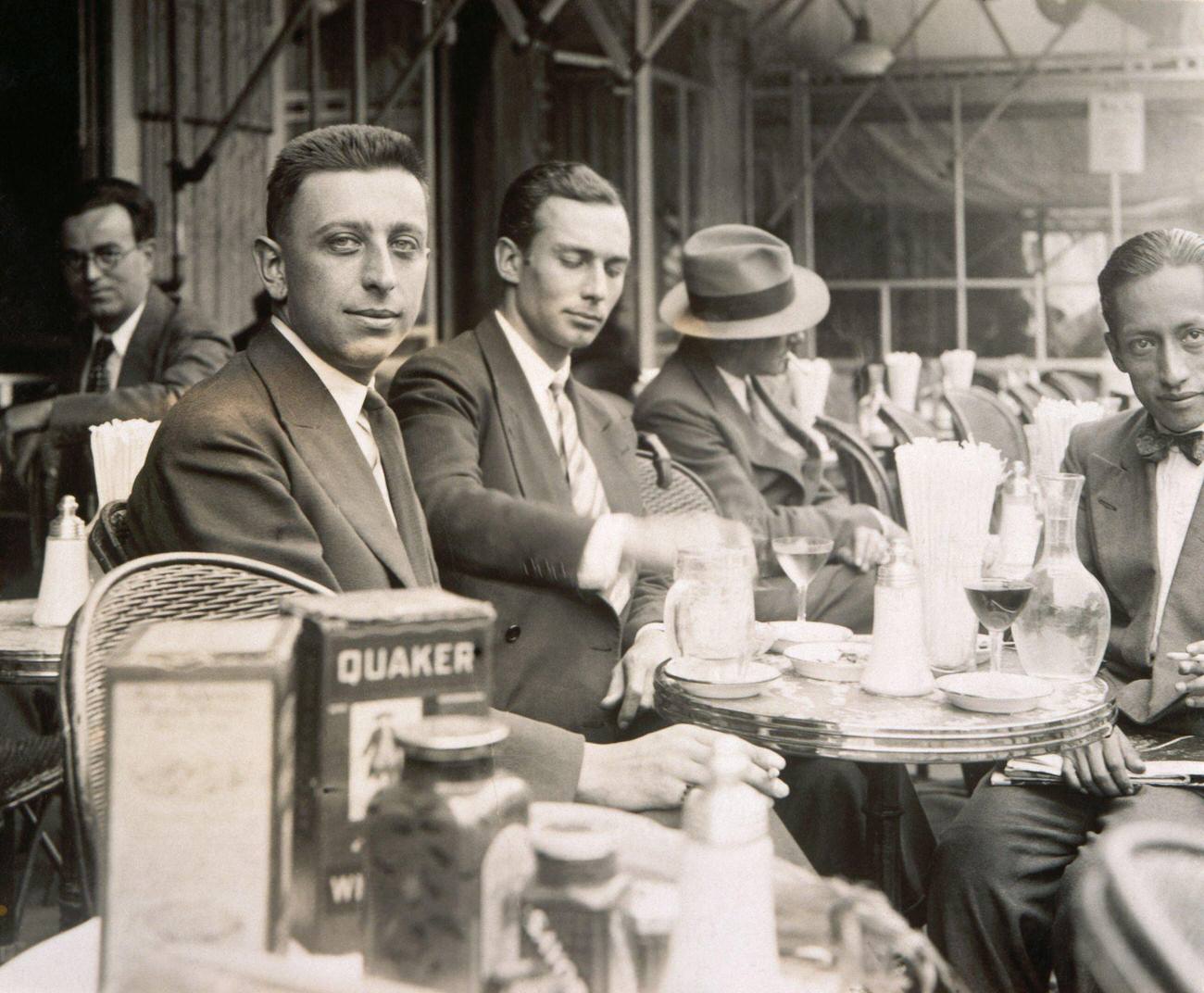 #9 Surrealist Poet Robert Desnos at a Cafe Terrace, Paris, Bibliotheque d’Art et d’Archeologie
