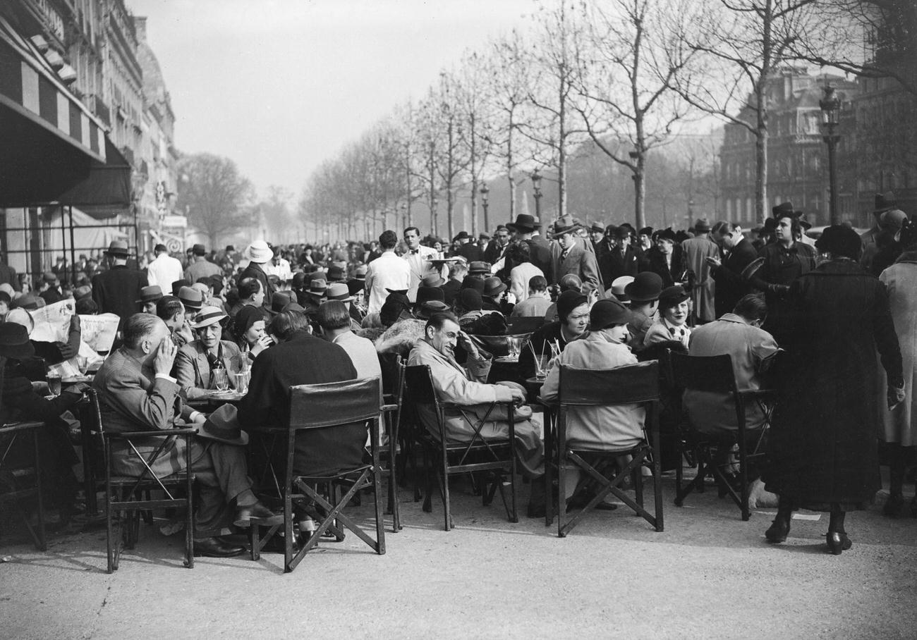 #44 Bustling Cafe Terrace, Champs Elysées, Paris, 2 April 1934