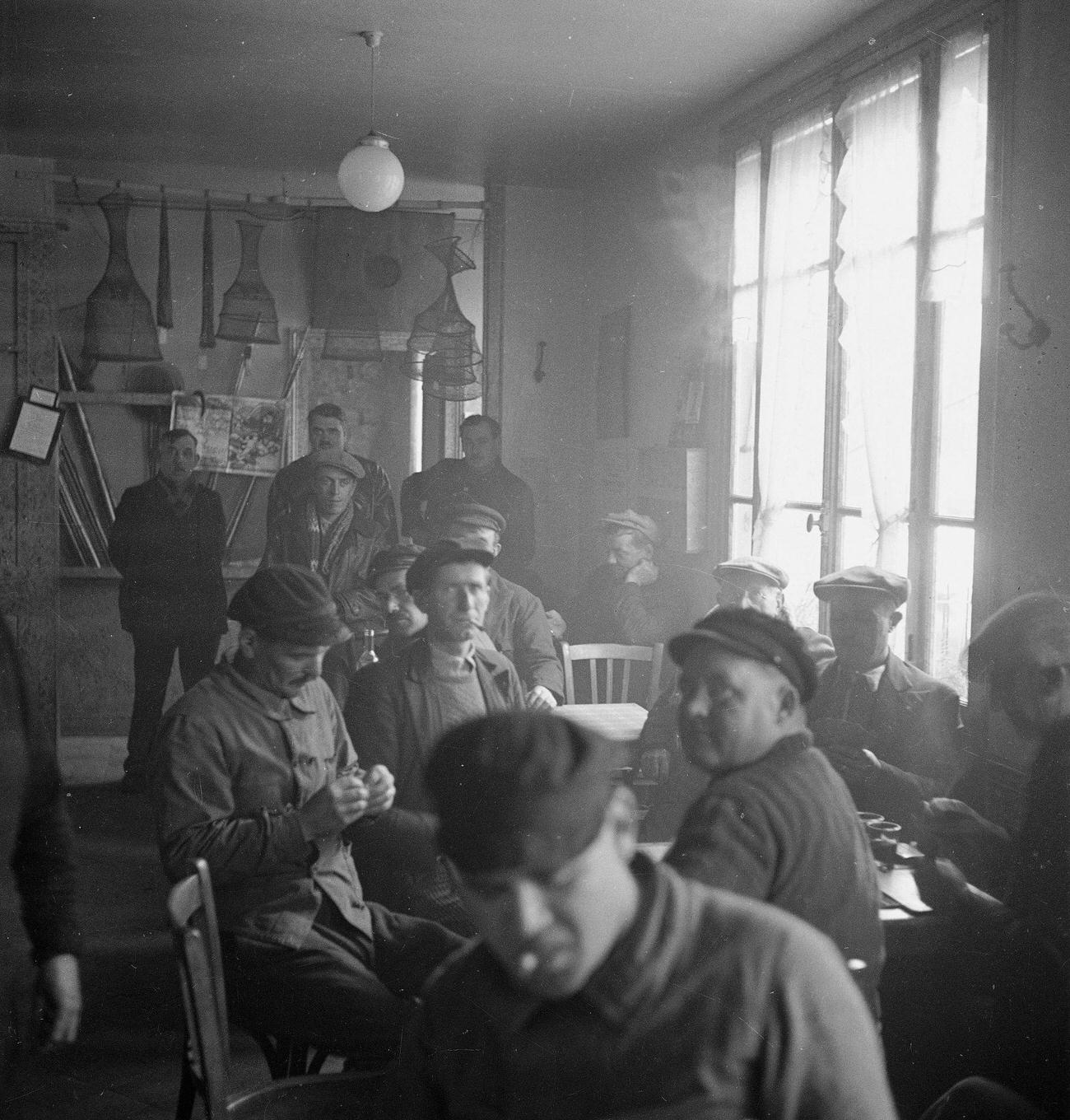#4 Fishermen and Barge Men at a Cafe in France, 1935
