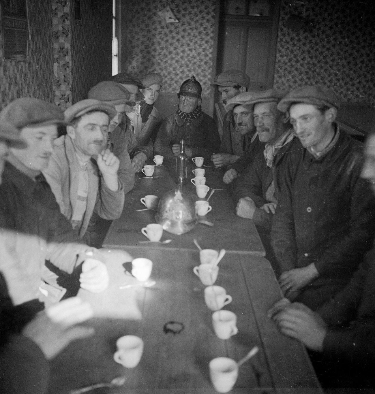#6 Cafe Meeting in Honor of a Fireman, France, 1935
