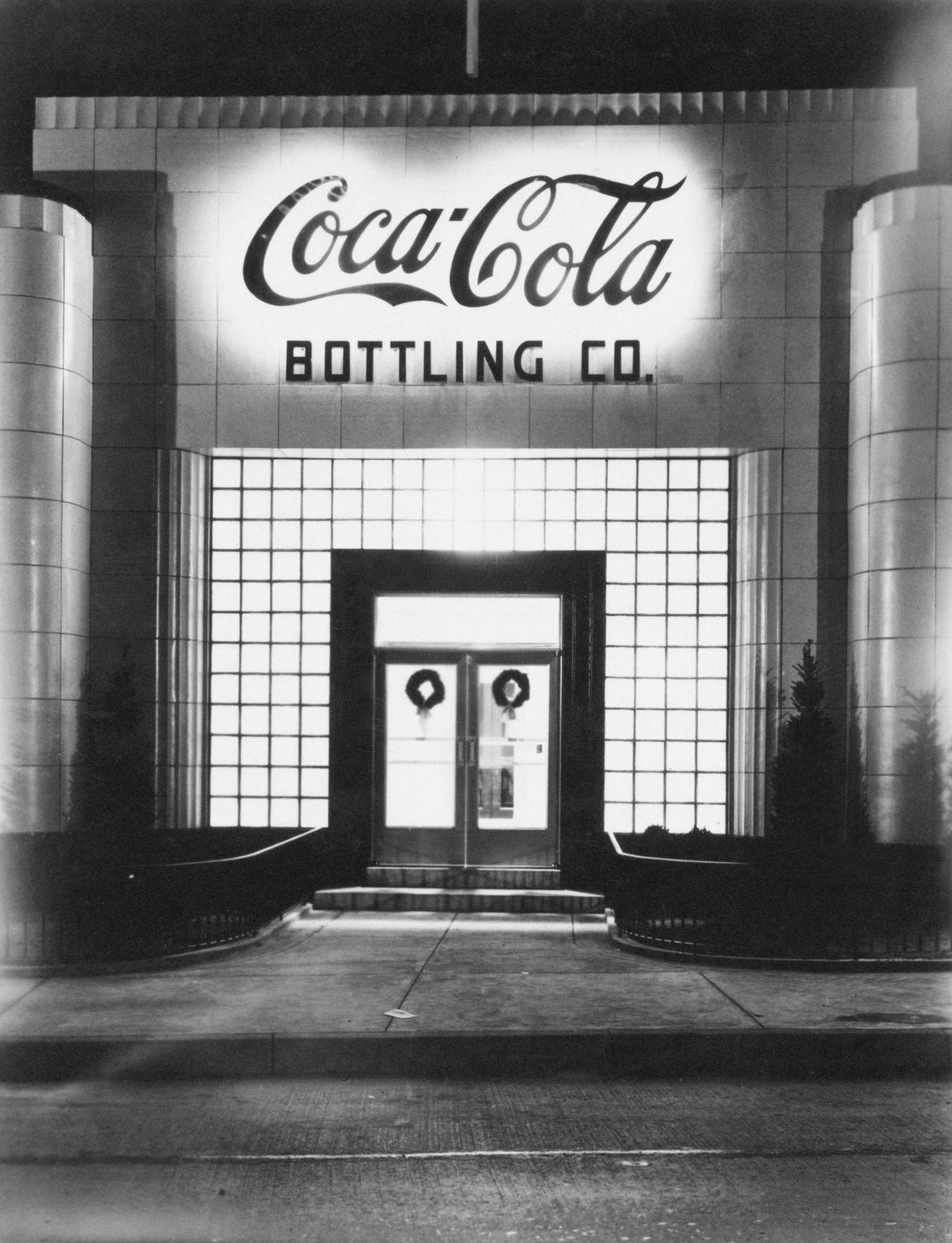 #63 Entrance of the Coca-Cola Bottling Company building, circa 1950.