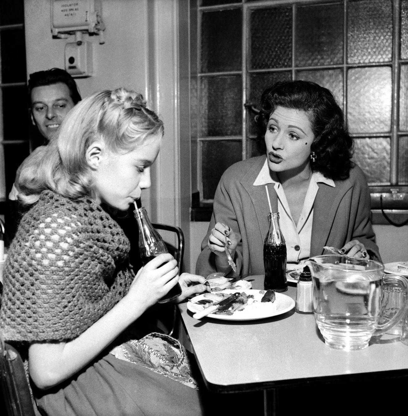 #74 Margaret Lockwood chaperoning her daughter Julia in a TV program, November 1953.
