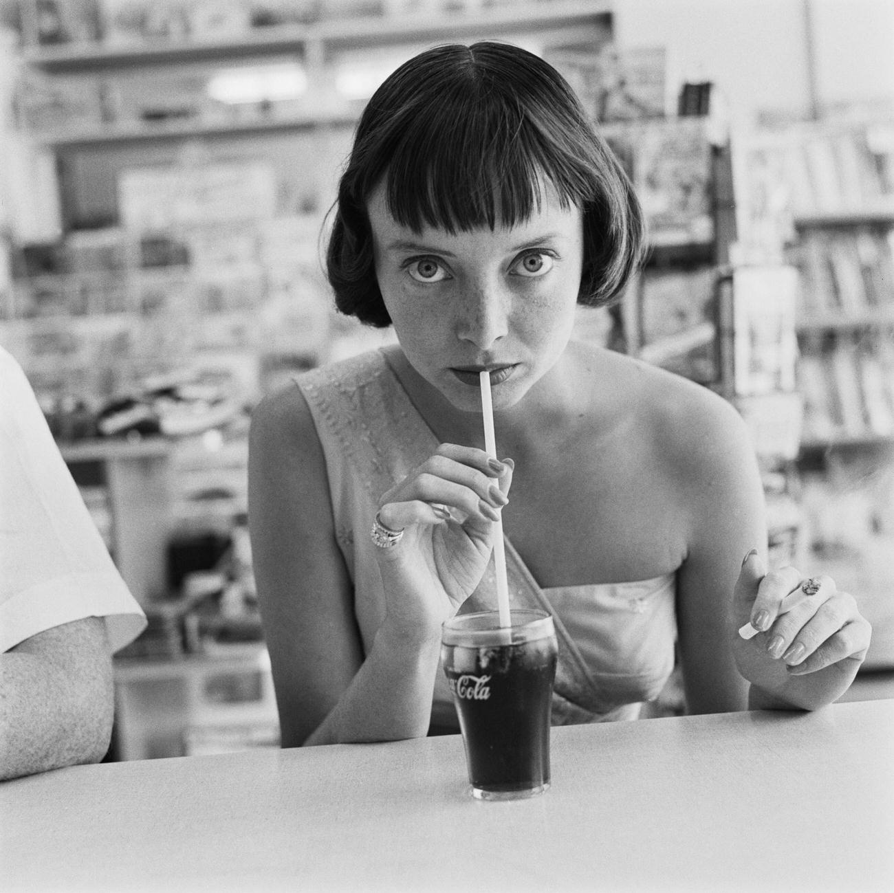 #11 Actress Carolyn Jones drinking Coca-Cola, USA, circa 1956.