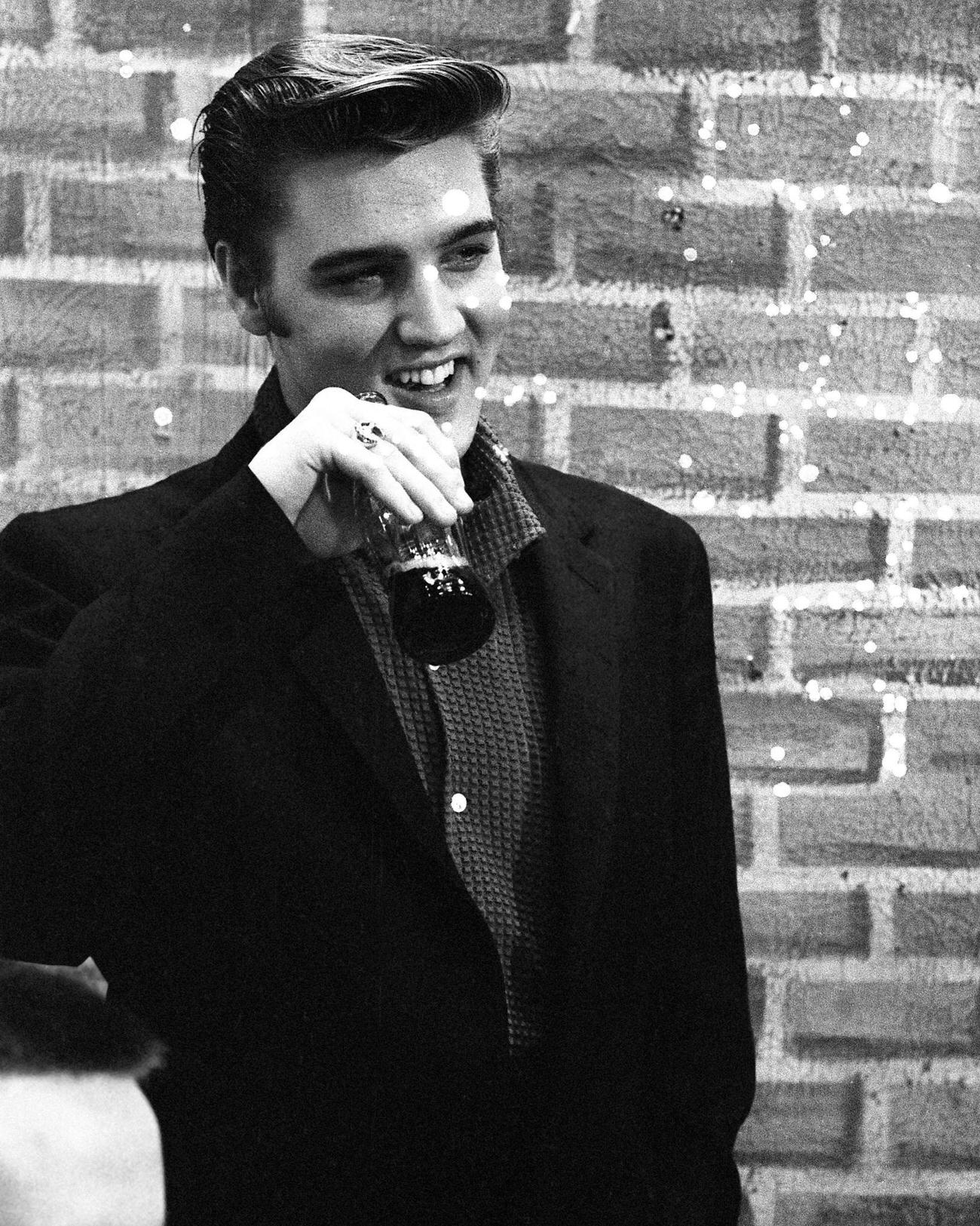 Singer Elvis Presley drinking Coca-Cola backstage on Wink Martindale’s show in Memphis, June 16, 1956.