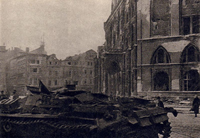 #15 Destroyed German tank in Prague’s Old Town Square, 1945.