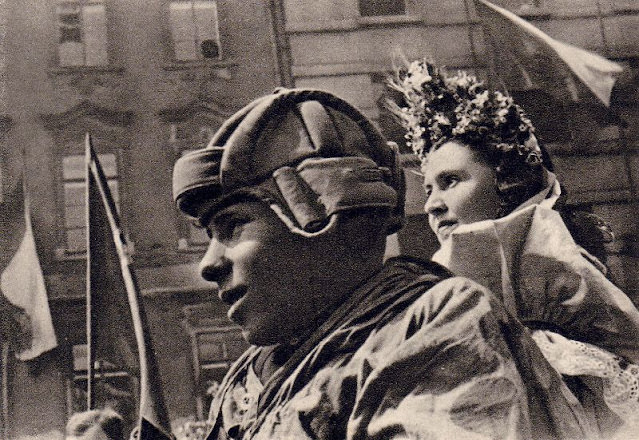 #37 Soldiers atop a tank in Prague, 1945.