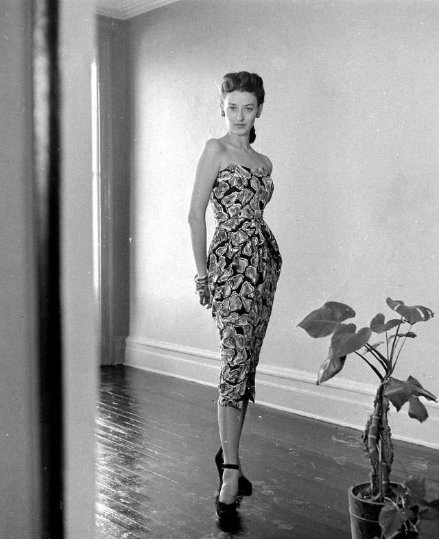 #10 Dorian Leigh in a sarong-style dress by Tina Leser, 1946.