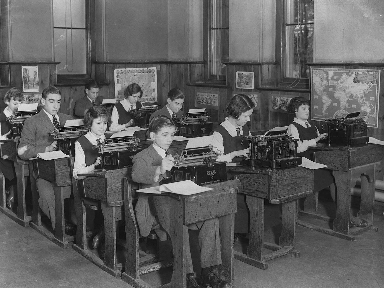 #25 Students practicing typing in a class in Slough.
