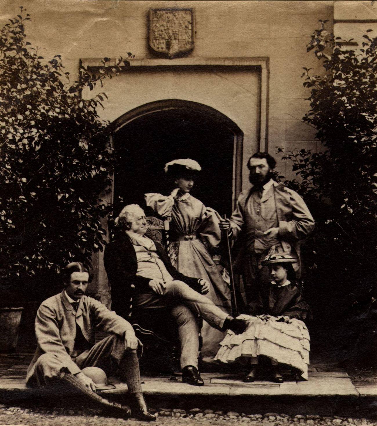 #102 A Victorian family group posing on their doorstep, September 1860.