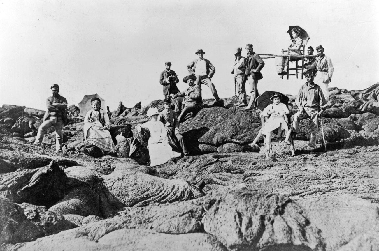 #11 Victorian tourists ascending Mount Vesuvius with local porters.