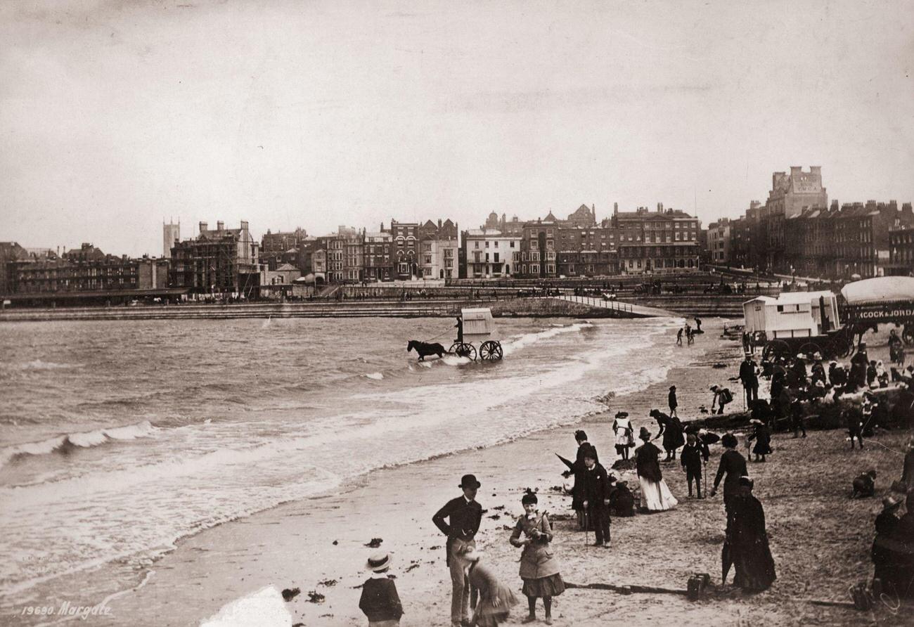 #107 Victorian daytrippers on Margate beach in Kent.