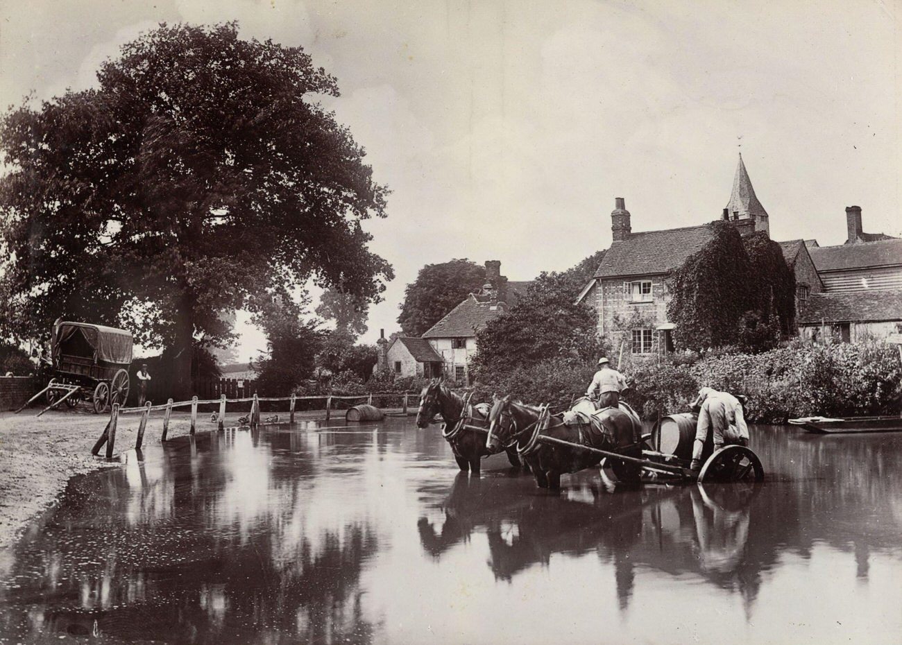 #17 Filling water wagons in an English village, 1890.