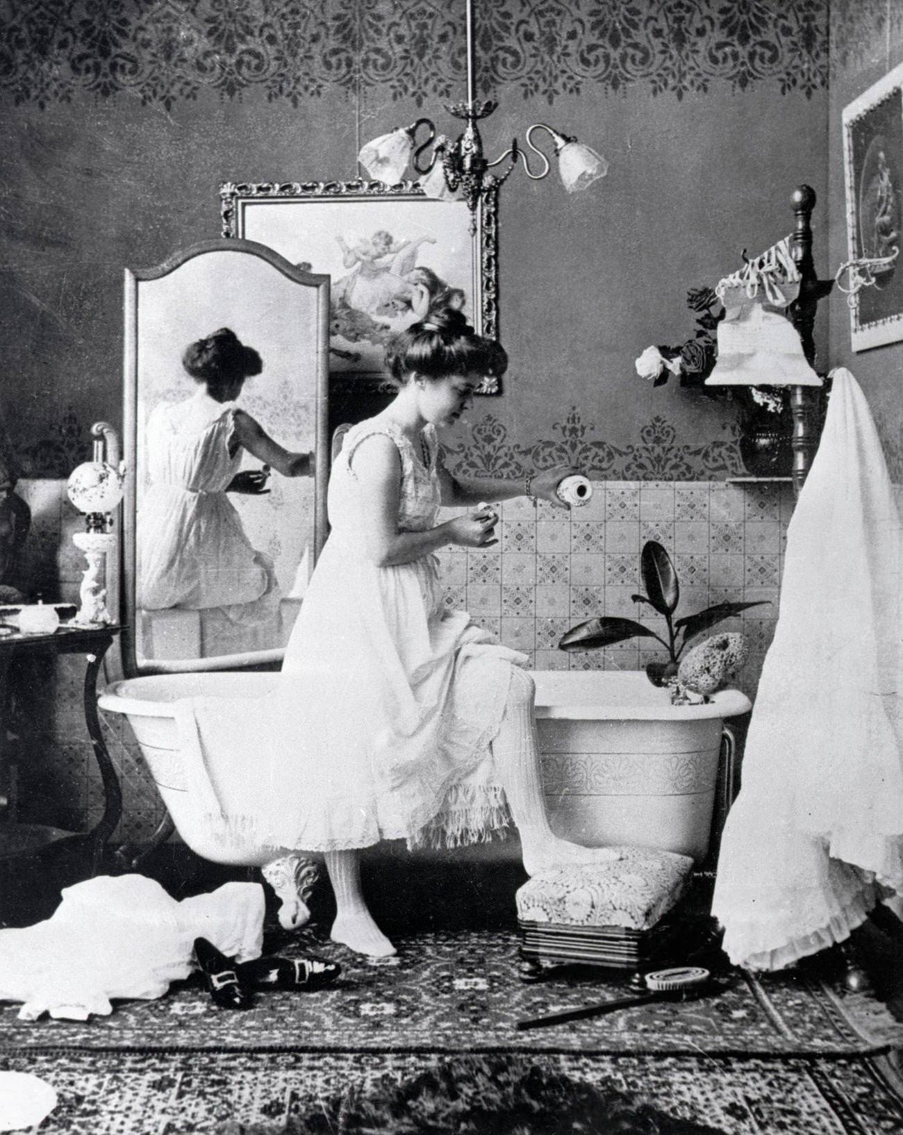#22 Victorian lady preparing for a bath, late 19th century.