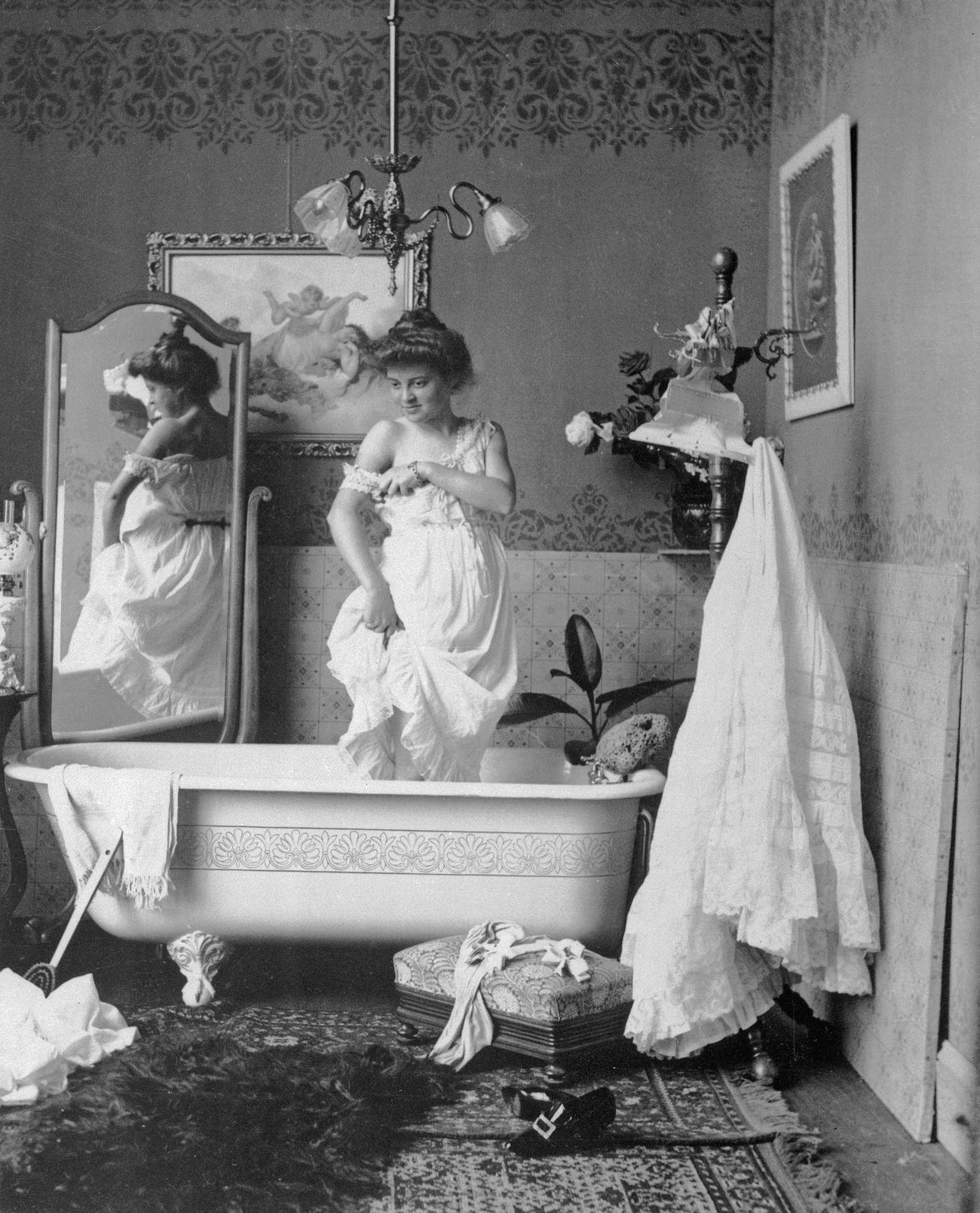 #24 Victorian woman about to bathe, late 19th century.