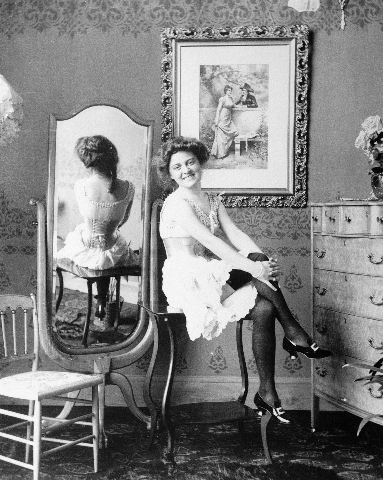 #27 Victorian woman in undergarments, circa 1890.