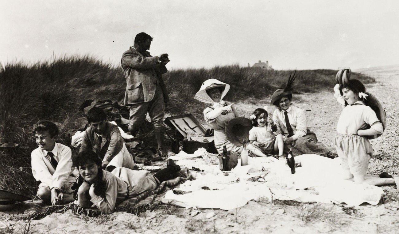 #42 Family picnic on the beach, circa 1895.