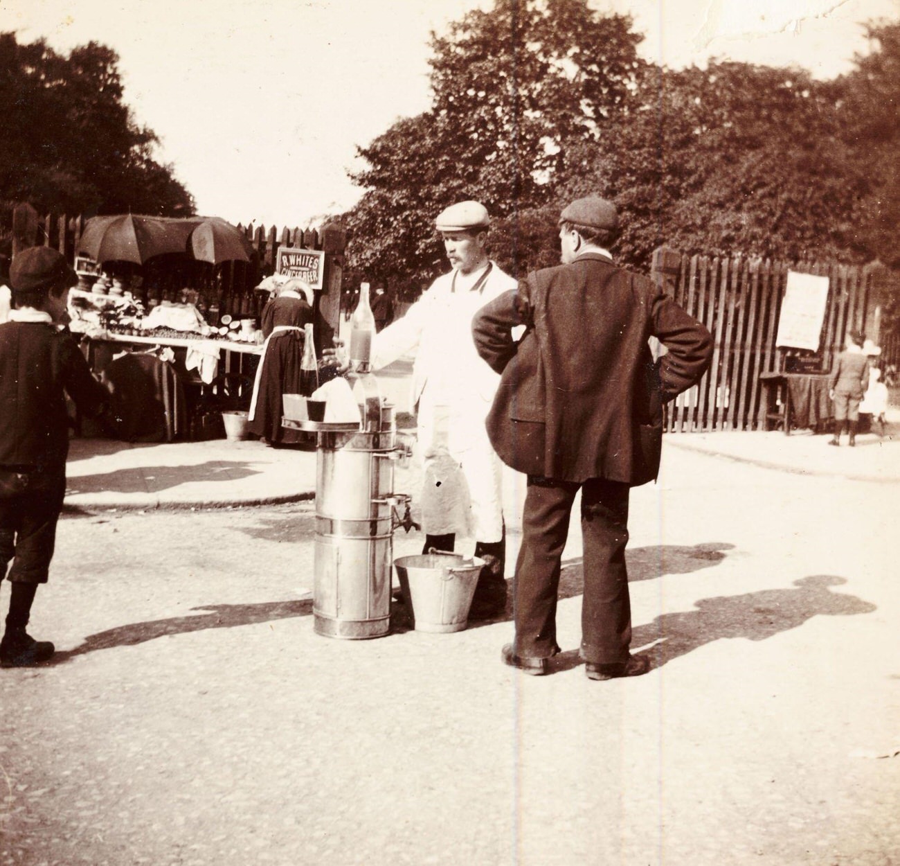 #50 Demonstration at a ‘R Whites Ginger beer’ stall, circa 1898.